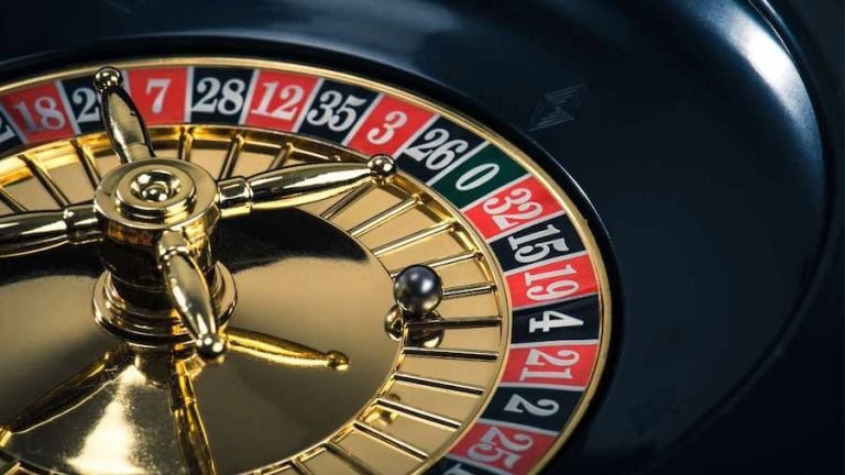 Evolution Gaming roulette wheel spinning with betting interface overlay on gacorbet55 mobile screen